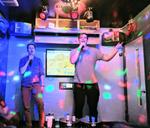 Chris Biscardi and Dustin Schau show off their karaoke skills.